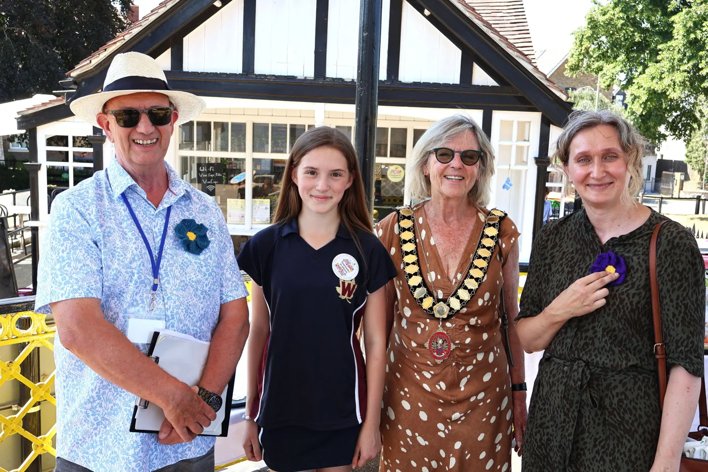 The Mayor of Sevenoaks, Cllr Victoria Granville, with In Bloom judges and young volunteer Willow Loudon