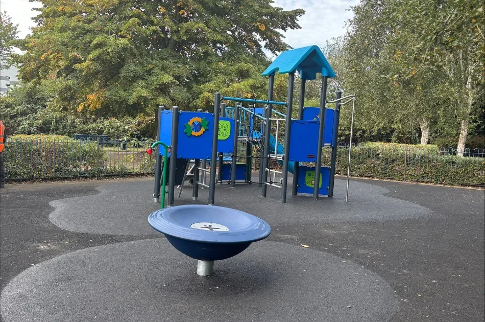 The refurbished Hilda May Playground in Swanley, with the accessible spinner in front of the new multi-play unit